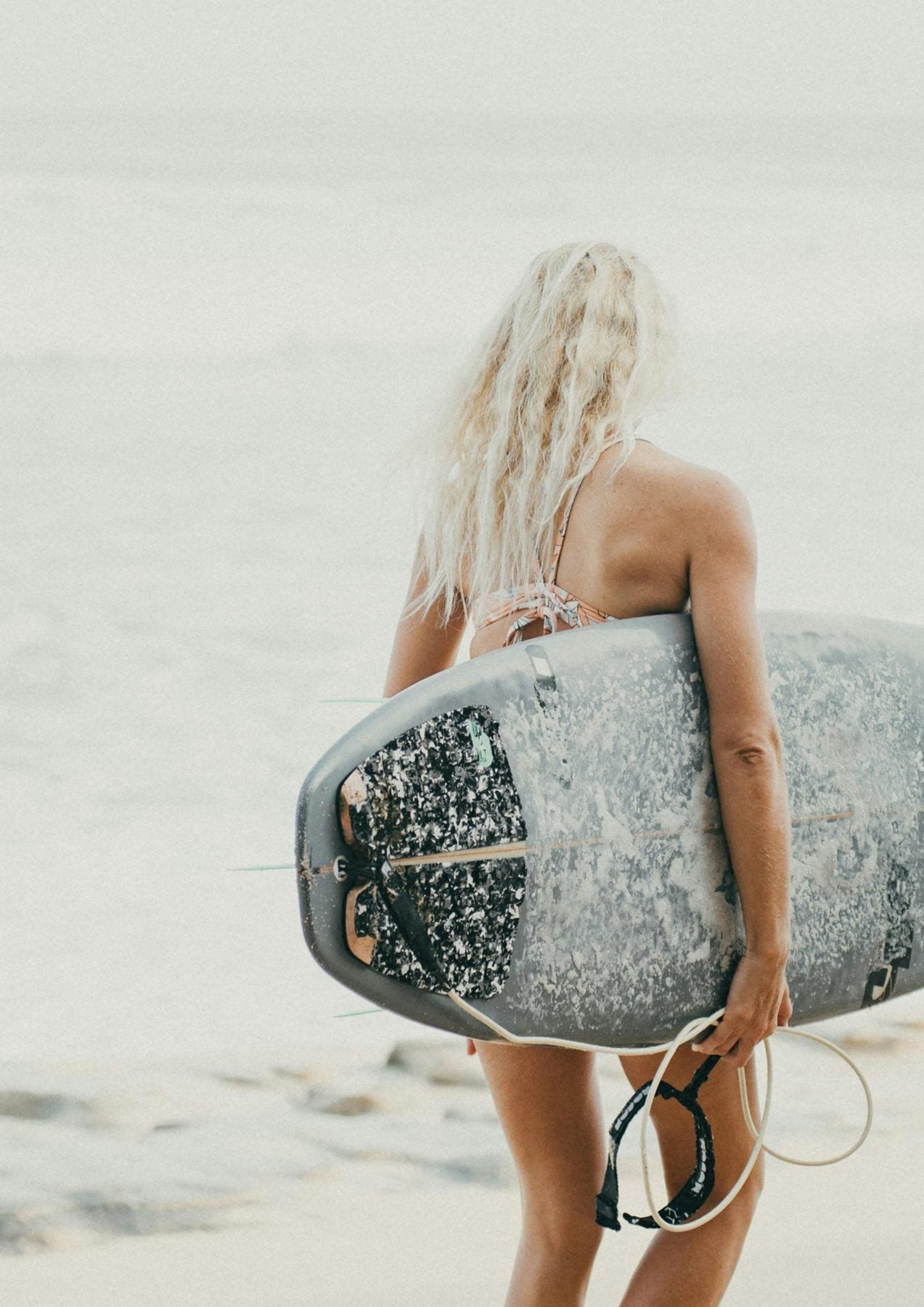 Surfer on a wave in Bali