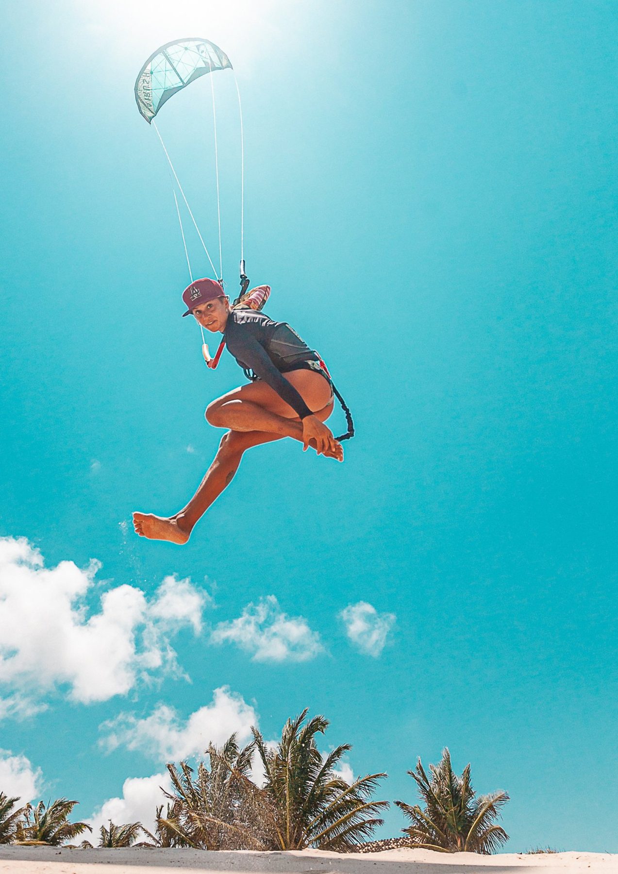 Kitesurfer on turquoise water